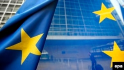 Belgium -- European flags are pictured in front of the European Commission Building, the Berlaymond, in Brussels Wednesday, 7 June 2006. 